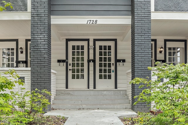 1728 N Delaware St, Indianapolis, IN 46202 - doorway to property with a porch