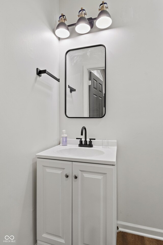 1728 N Delaware St, Indianapolis, IN 46202 - bathroom featuring vanity and baseboards