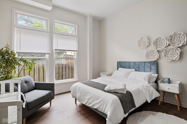 1728 N Delaware St, Indianapolis, IN 46202 - bedroom with wood finished floors and baseboards