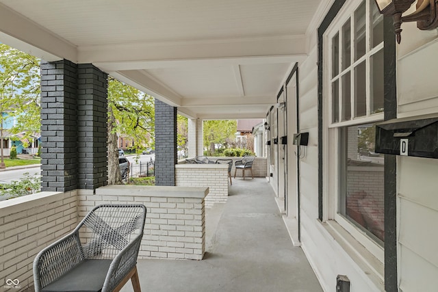 1728 N Delaware St, Indianapolis, IN 46202 - view of patio / terrace featuring covered porch
