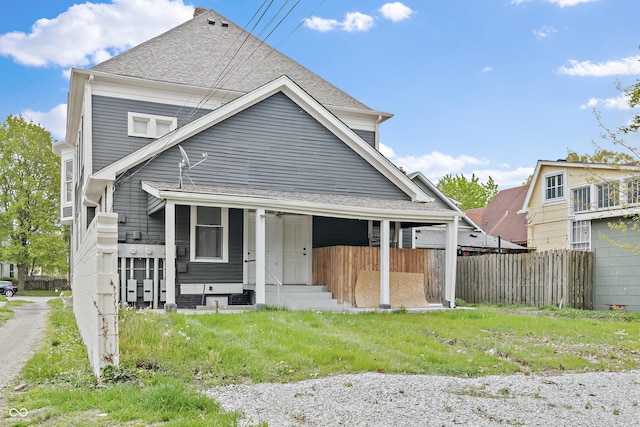 1728 N Delaware St, Indianapolis, IN 46202 - back of property featuring fence and a shingled roof
