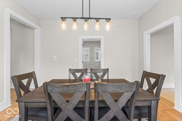 1505 Spann Ave, Indianapolis, IN 46203 - dining area with light wood-style flooring