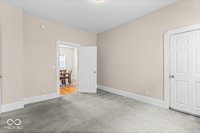 1505 Spann Ave, Indianapolis, IN 46203 - unfurnished bedroom featuring carpet floors and baseboards