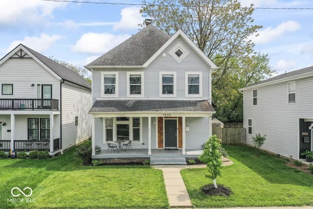 1505 Spann Ave, Indianapolis, IN 46203 - view of front of house with a porch and a shingled roof