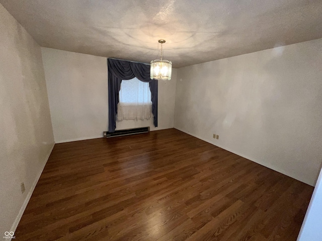 1949 Shenandoah Pl, Indianapolis, IN 46229 - spare room with a chandelier and dark wood-style floors
