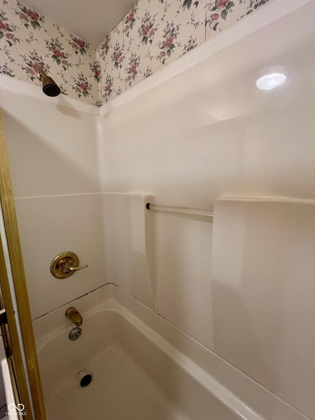 1949 Shenandoah Pl, Indianapolis, IN 46229 - bathroom with wallpapered walls and shower / tub combination