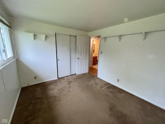 1949 Shenandoah Pl, Indianapolis, IN 46229 - unfurnished bedroom with carpet floors, baseboards, and a closet