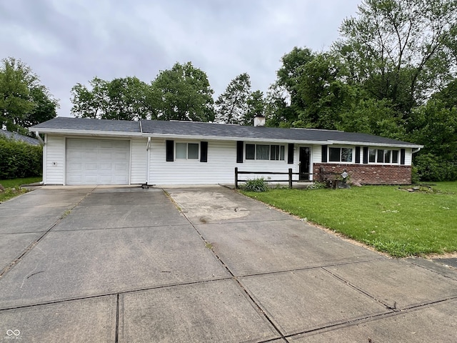 1949 Shenandoah Pl, Indianapolis, IN 46229 - single story home featuring an attached garage, driveway, a front yard, and a chimney