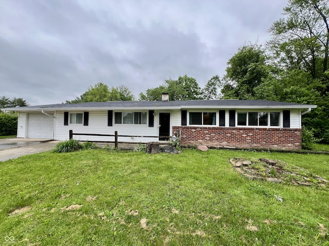 1949 Shenandoah Pl, Indianapolis, IN 46229 - ranch-style home featuring a garage, a front yard, driveway, and brick siding