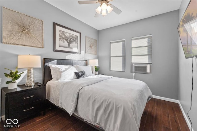 3818 Central Ave, Indianapolis, IN 46205 - bedroom featuring dark wood finished floors, cooling unit, baseboards, and ceiling fan