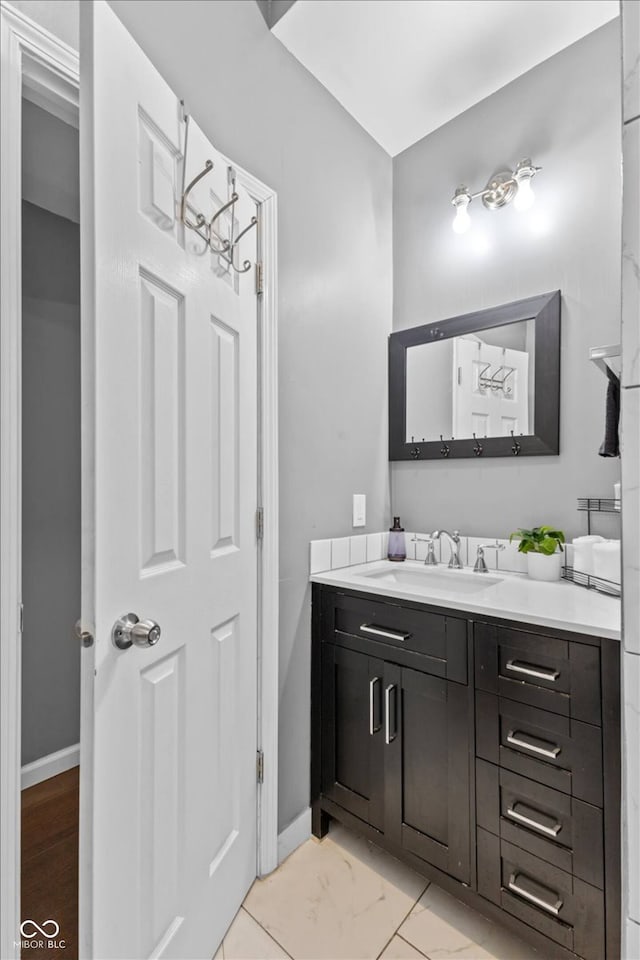 3818 Central Ave, Indianapolis, IN 46205 - bathroom with vanity and baseboards
