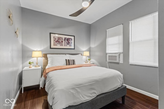 3818 Central Ave, Indianapolis, IN 46205 - bedroom with baseboards, cooling unit, wood-type flooring, and a ceiling fan