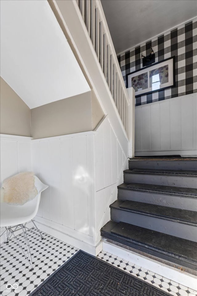 3818 Central Ave, Indianapolis, IN 46205 - staircase featuring a decorative wall and a wainscoted wall