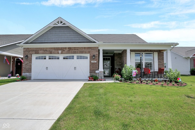 craftsman-style house with a garage, a porch, a front yard, brick siding, and driveway