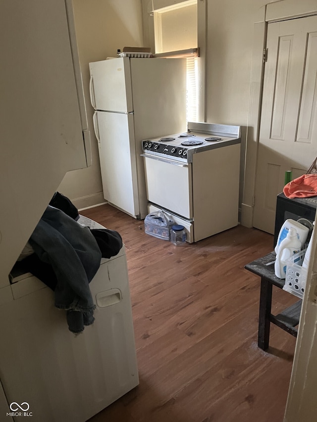 1420 Indiana Ave, New Castle, IN 47362 - kitchen with white range with electric cooktop and wood finished floors