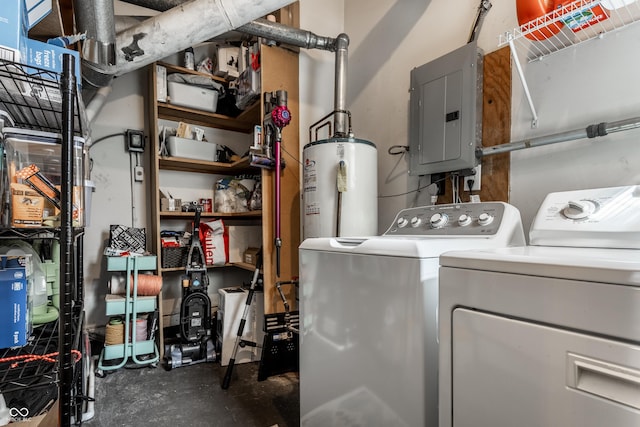 laundry area with electric panel, gas water heater, and washing machine and dryer