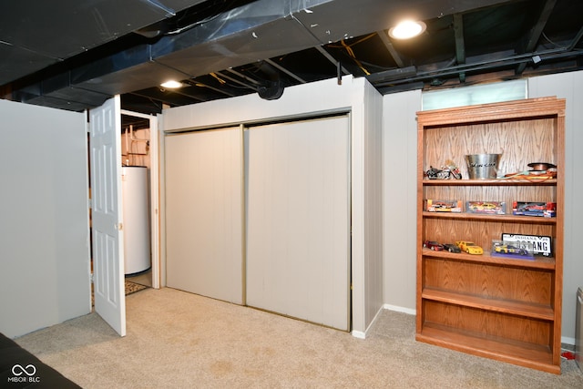finished below grade area with water heater and carpet flooring