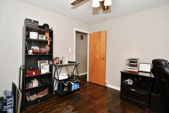 office space with crown molding, hardwood / wood-style flooring, baseboards, and a ceiling fan