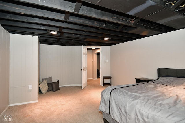 carpeted bedroom featuring baseboards