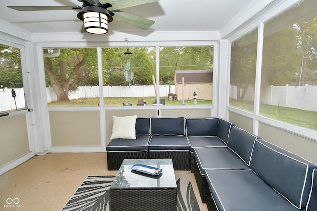 sunroom / solarium featuring an outdoor hangout area, a wealth of natural light, and ceiling fan