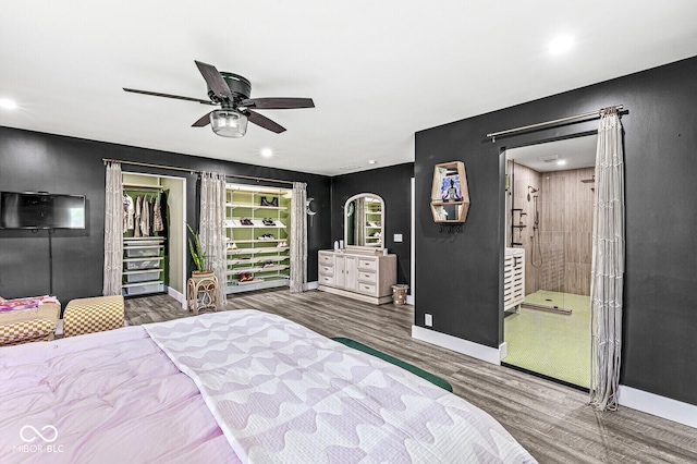 bedroom with wood finished floors, baseboards, recessed lighting, and ceiling fan