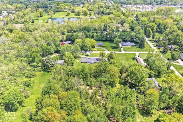 aerial overview of property's location with a nearby body of water