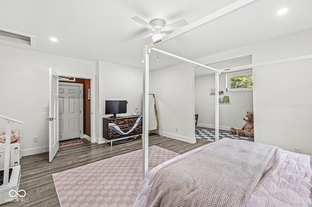 bedroom with wood finished floors, baseboards, an office area, ceiling fan, and recessed lighting