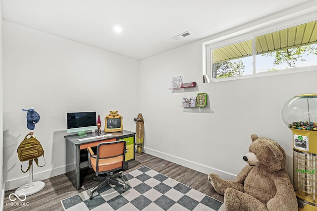 office with baseboards, healthy amount of natural light, wood finished floors, and recessed lighting