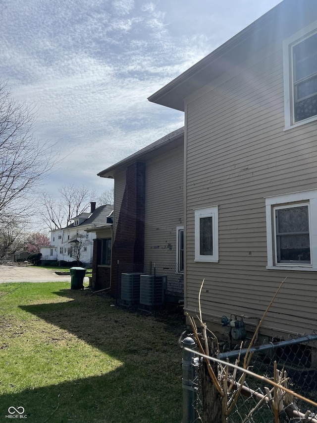 view of home's exterior featuring central AC unit