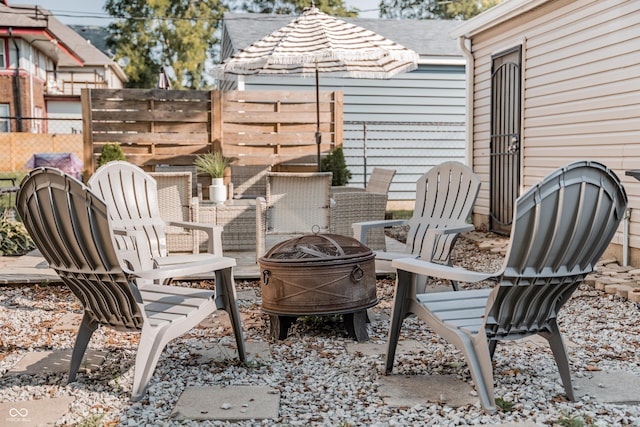 2407 N Capitol Ave, Indianapolis, IN 46208 - view of patio / terrace featuring a fire pit and fence