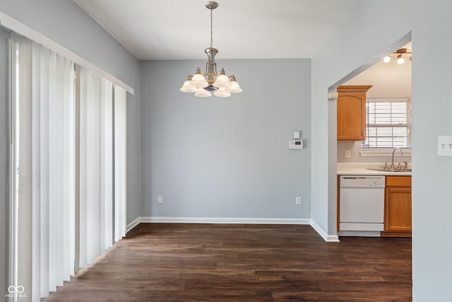 4136 Orchard Valley Ln, Indianapolis, IN 46235 - unfurnished dining area featuring dark wood-type flooring, a chandelier, a sink, and baseboards