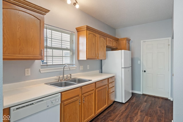 4136 Orchard Valley Ln, Indianapolis, IN 46235 - kitchen featuring white appliances, a sink, dark wood-style floors, light countertops, and a textured ceiling