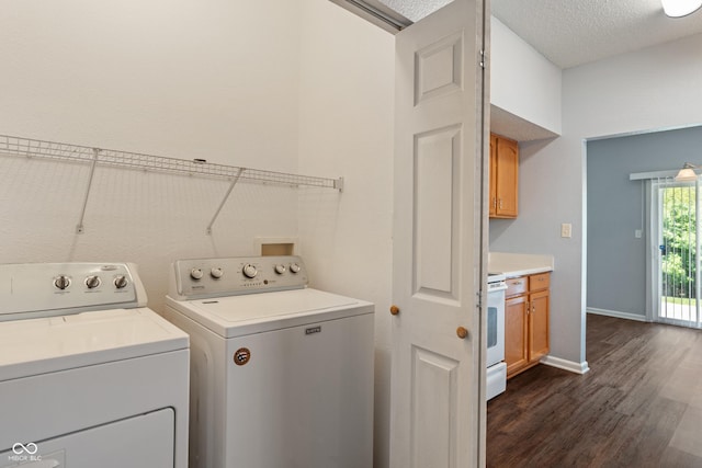 4136 Orchard Valley Ln, Indianapolis, IN 46235 - laundry room with washer and clothes dryer, dark wood-style floors, and baseboards
