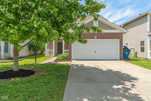 4136 Orchard Valley Ln, Indianapolis, IN 46235 - obstructed view of property with brick siding, concrete driveway, a front lawn, and a garage