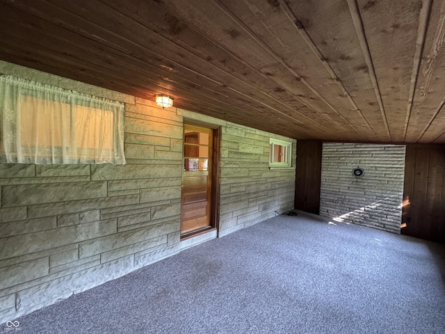 1314 E Orange Pike, Rushville, IN 46173 - carpeted spare room with wood ceiling and wood walls