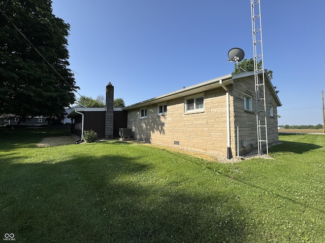 1314 E Orange Pike, Rushville, IN 46173 - back of property featuring a yard and a chimney
