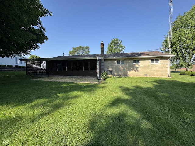 1314 E Orange Pike, Rushville, IN 46173 - rear view of house featuring a yard and crawl space