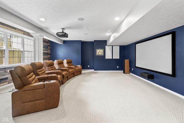 carpeted cinema with baseboards, decorative columns, and recessed lighting
