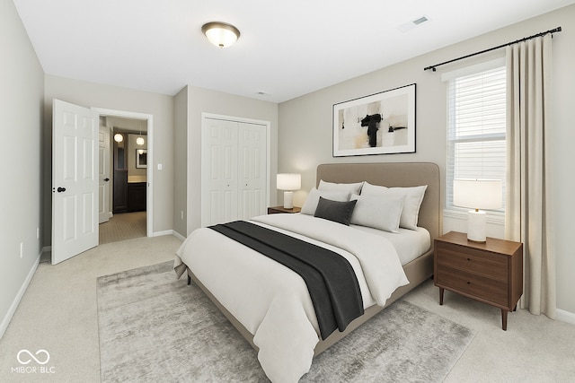 bedroom featuring light carpet, baseboards, and a closet