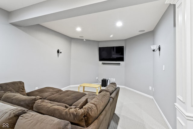living room featuring carpet floors, baseboards, and recessed lighting