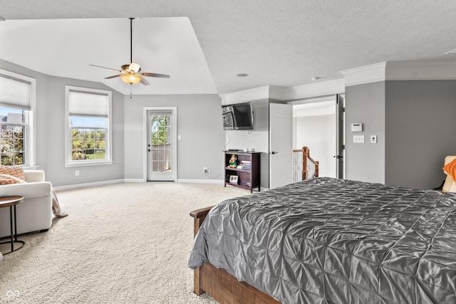 bedroom featuring access to outside, carpet, baseboards, crown molding, and lofted ceiling