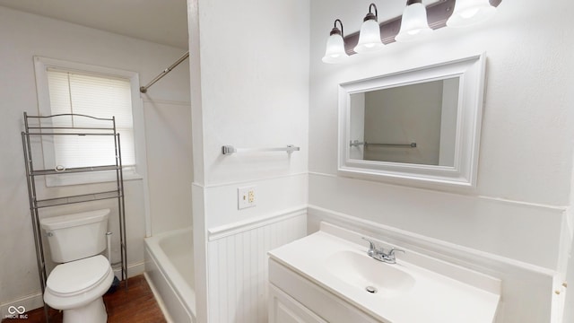 1600 N Washington St, Kokomo, IN 46901 - full bathroom featuring vanity, wainscoting, shower / tub combination, and wood finished floors