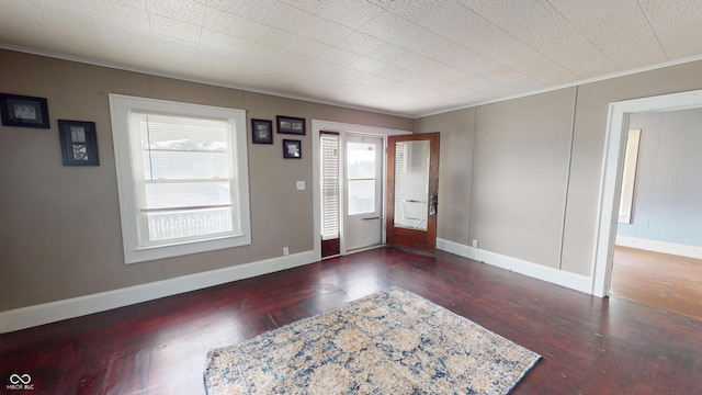 1600 N Washington St, Kokomo, IN 46901 - entrance foyer with ornamental molding, hardwood / wood-style floors, and plenty of natural light
