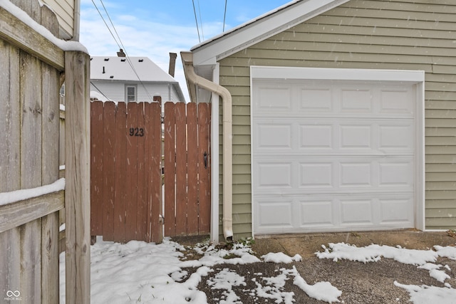 923 S State Ave, Indianapolis, IN 46203 - snow covered garage with a gate and fence