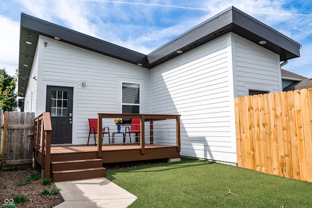 1112 Spann Ave, Indianapolis, IN 46203 - rear view of house with a wooden deck