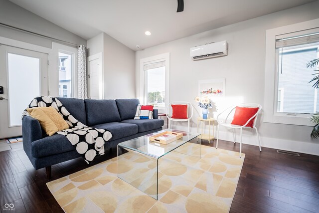 1112 Spann Ave, Indianapolis, IN 46203 - living room featuring a wall mounted AC, plenty of natural light, hardwood / wood-style flooring, recessed lighting, and baseboards