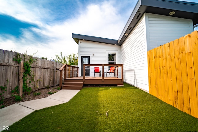 1112 Spann Ave, Indianapolis, IN 46203 - rear view of property with a wooden deck