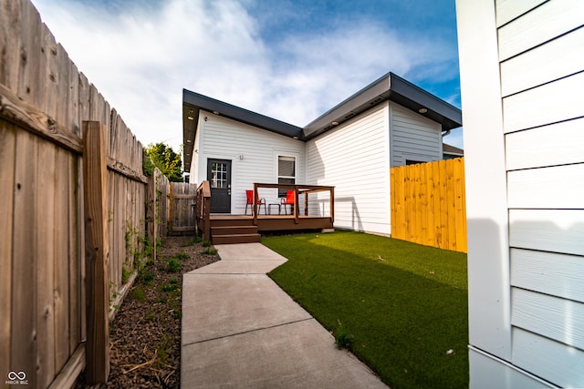 1112 Spann Ave, Indianapolis, IN 46203 - back of house with a wooden deck