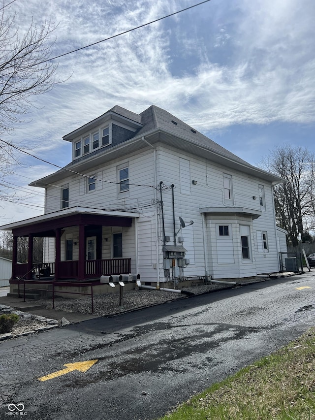view of home's exterior featuring covered porch