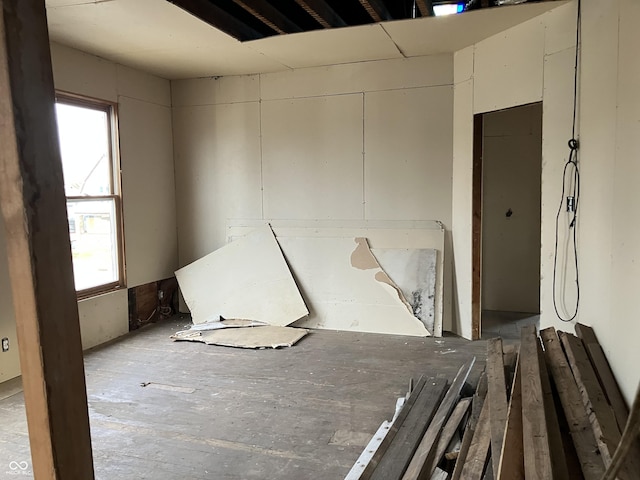 unfurnished bedroom with multiple windows